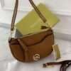 MICHAEL KORS HALF MOON CROSSBODY BAG